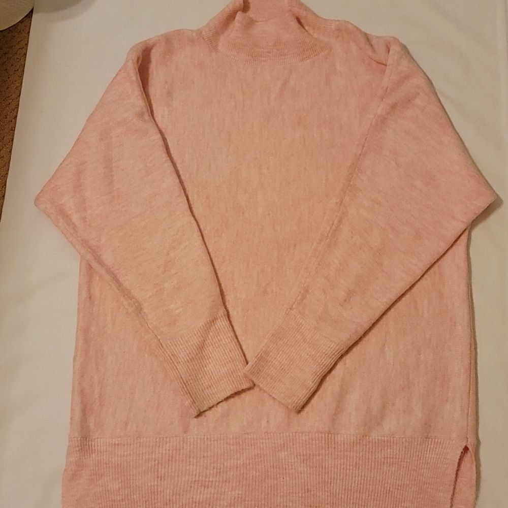 Magaschoni sweater size large.‎